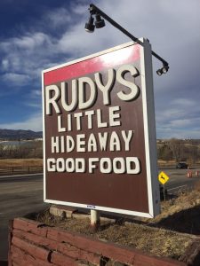rudy's little hideaway sign